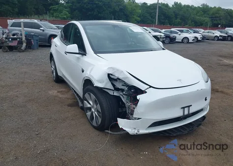 2023 Tesla Model Y из США, поврежденный, VIN 7SAYGDEE9PF684846